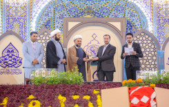 راية المولى أبيّ الفضل العباس تعانق راية أمير المؤمنين بعد حصول فريق النجف الأشرف على المركز الأول في المسابقة القرآنية الفرقية الوطنية الخامسة